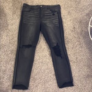jeans that are distressed with step hem bottoms